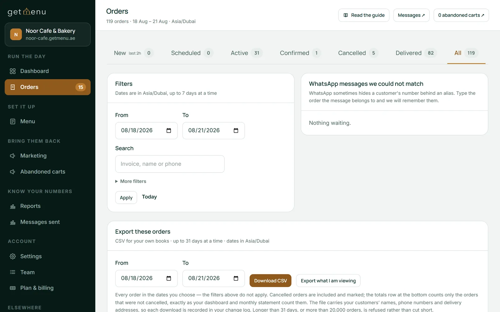 The Orders page of the GetMenu dashboard for the demo restaurant Noor Cafe & Bakery. Tabs across the top read New, Scheduled, Active, Confirmed, Cancelled, Delivered and All, each with a count. Below them are date filters, a search box for invoice, name or phone, and a card for WhatsApp messages that could not be matched to an order.